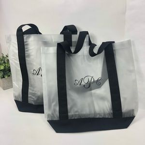 SET of 2 transparent Air-Tex Norwood CLEAR totes Bags has the initial “ APC “